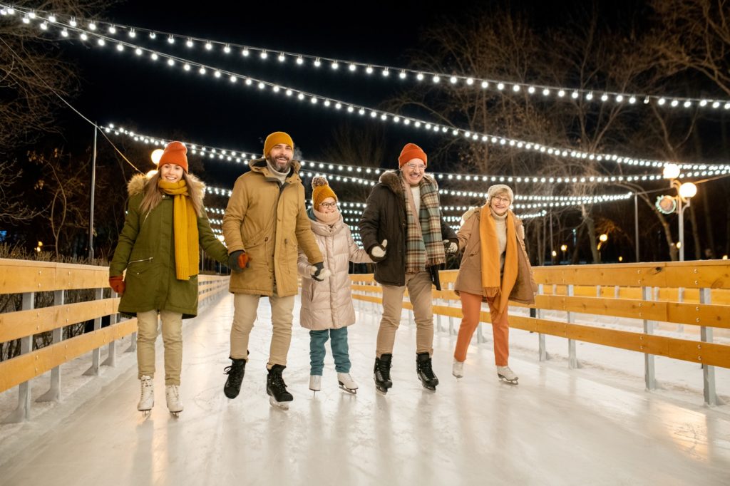 Big family on skating rink