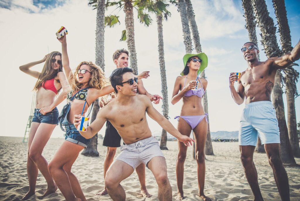 Friends partying on the beach