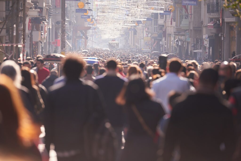 people crowd walking on street