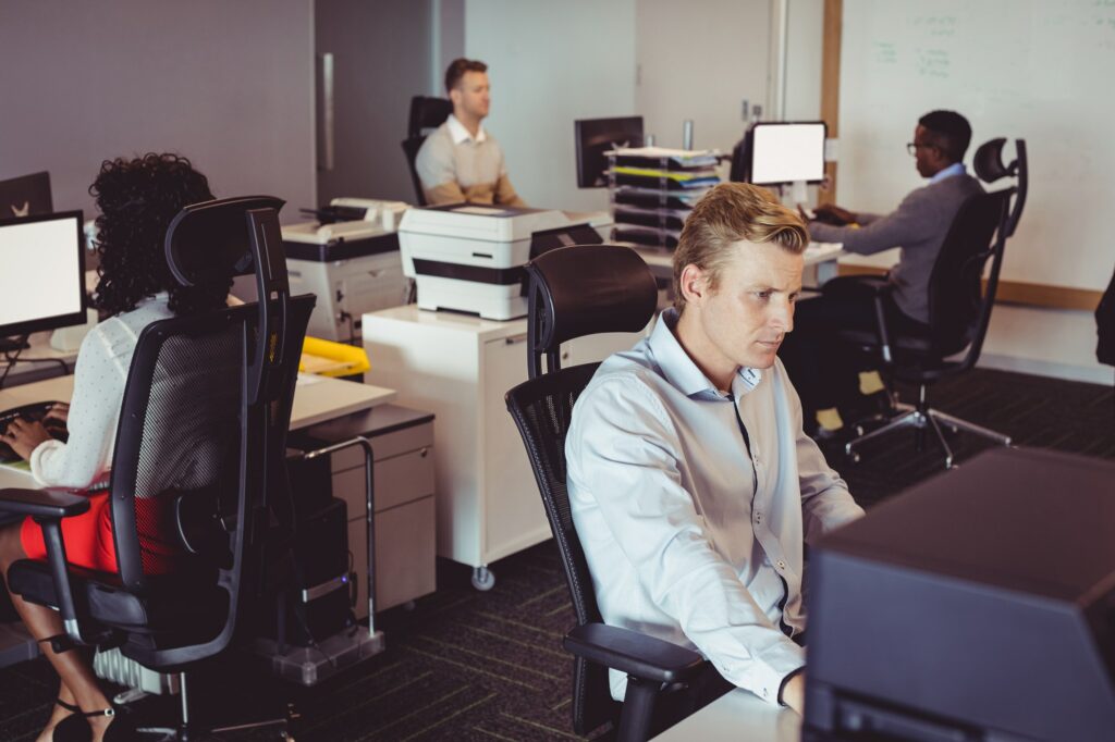 Business colleagues working at desk